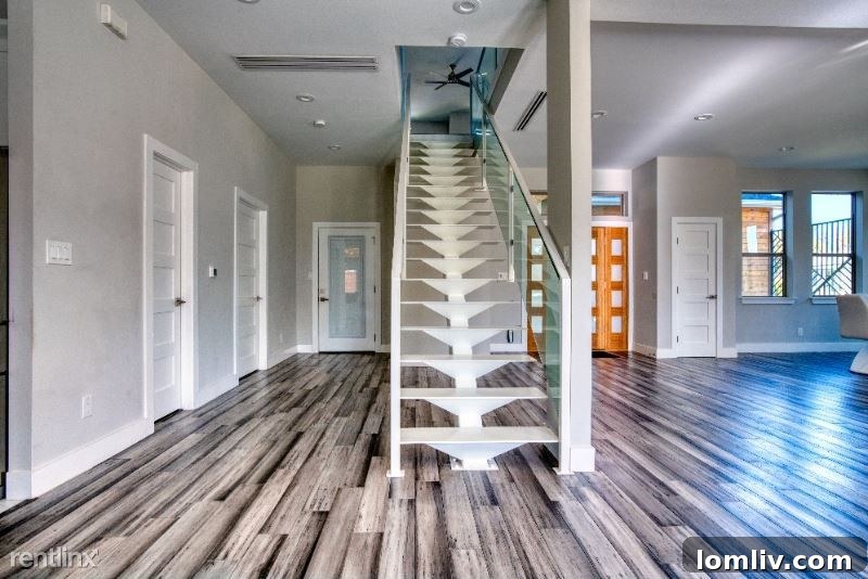 Experience Greenway Parks Luxury Now: Flexible Leasing, No Million-Dollar Commitment 4 Stylish dining area and kitchen connection in the Hopkins Avenue rental home