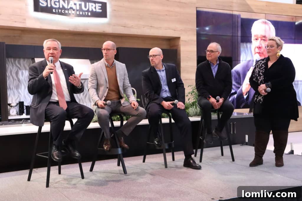 Learning about Sustainability from the best in the Signature Kitchen Suite booth.
