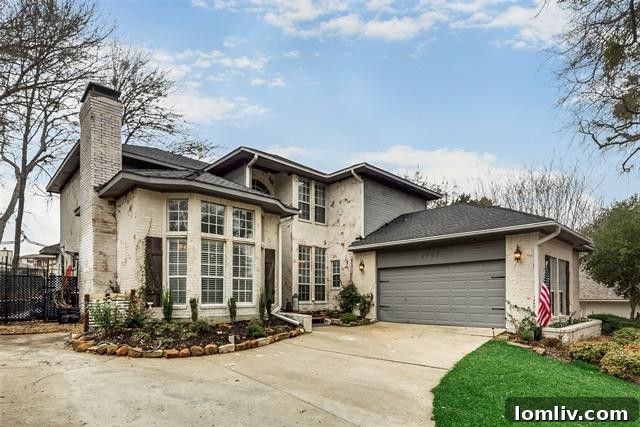 Rockwall Lake Home with Black Kitchen Cabinets