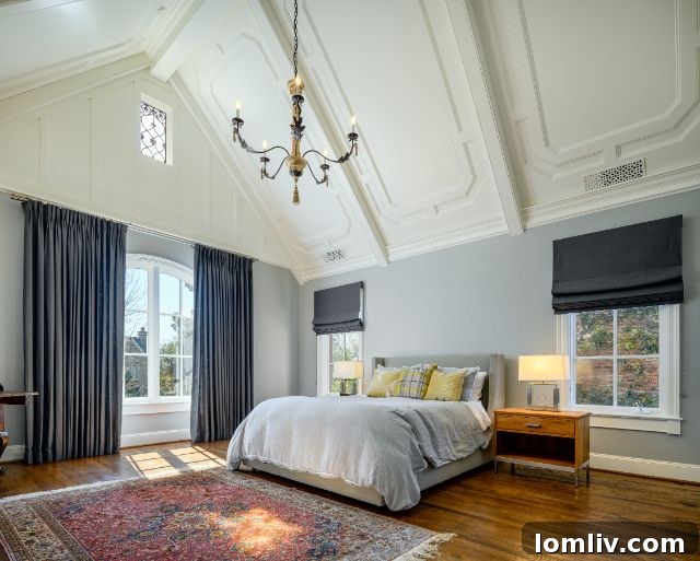 Opulent master bathroom with elegant fixtures and a large soaking tub