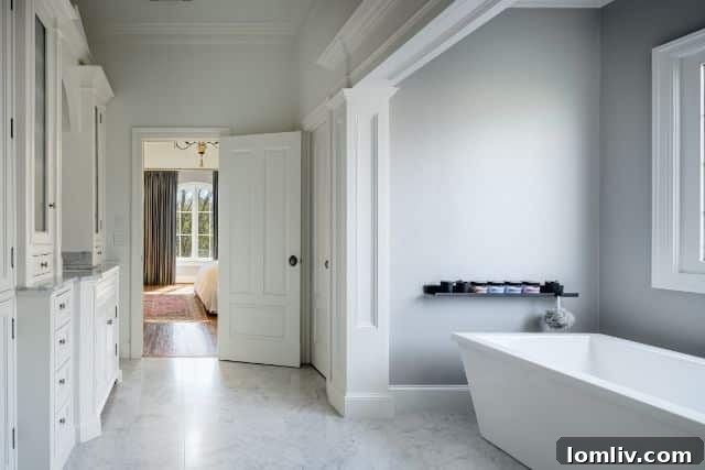 Spacious master bedroom with vaulted ceilings and a comfortable sitting area with fireplace