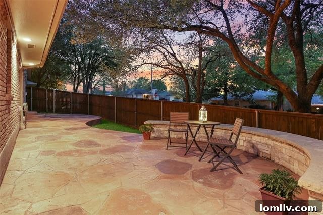 Inviting outdoor stone patio with built-in bench seating