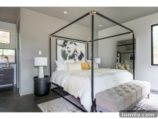 Forest Hills Modern Ranch Reimagined 12 Inviting living room centered around a contemporary fireplace with comfortable seating and elegant decor