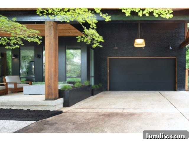 Forest Hills Modern Ranch Reimagined 3 Expansive, lush backyard of the modern ranch home, ideal for family activities and entertaining