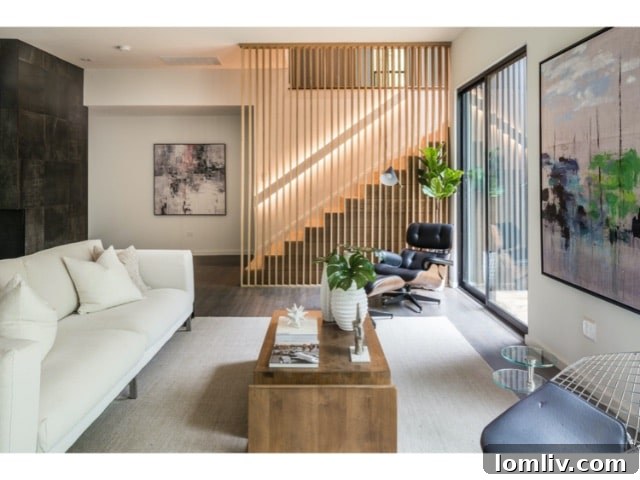 Forest Hills Modern Ranch Reimagined 7 Elegantly designed living space featuring a modern wooden room divider and sophisticated decor