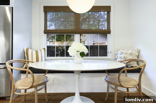 Light-Filled Living Room with Gleaming Hardwood Floors in Oak Lawn Home