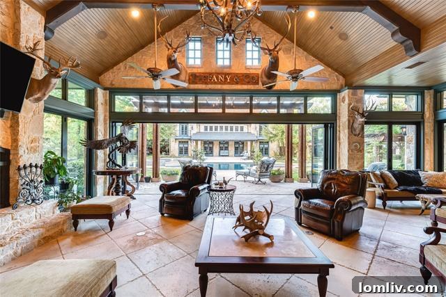 Resort-Style Pool with Sunken Fire Pit in Luxury Dallas Backyard