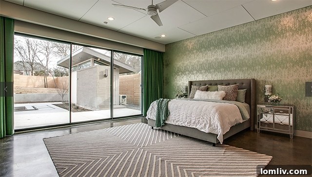 Bedroom with large windows, emphasizing the importance of high-quality sealing for energy efficiency in New Leaf Custom Homes