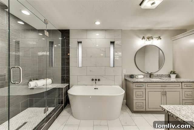 Luxurious oversized master suite in the Lake Highlands ranch, featuring a spa-bath with a barn door, rain shower, and modern tub