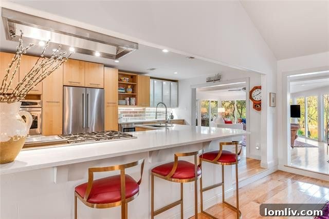 Luxurious custom kitchen in the Lochwood home, featuring modern appliances, ample counter space, and stylish cabinetry