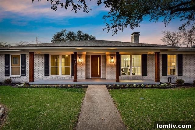 Attractive exterior of a fully renovated ranch home in Lake Highlands, Northeast Dallas, featuring a pristine lawn and inviting entrance