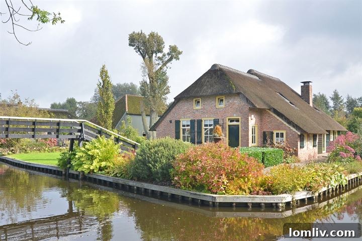 Giethoorn house with a unique architectural design and canal access