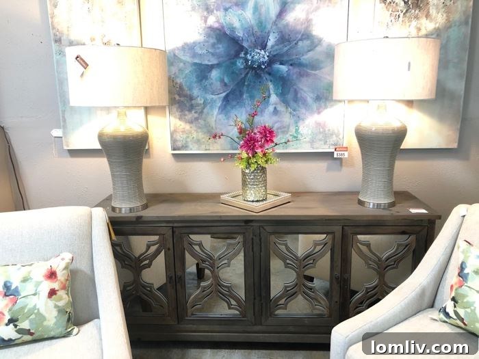 A detailed shot of a rustic yet elegant reclaimed wood dining table, showcasing its unique grain and texture, available at the Dallas Estate Sellers liquidation.