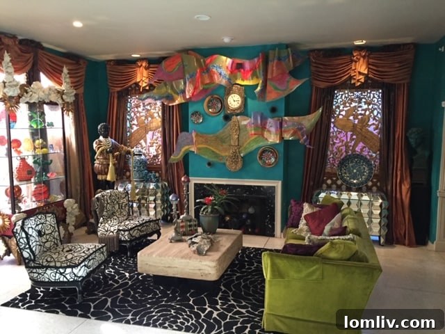 The original living room of the modern mansard home, with outdated decor and dark tones