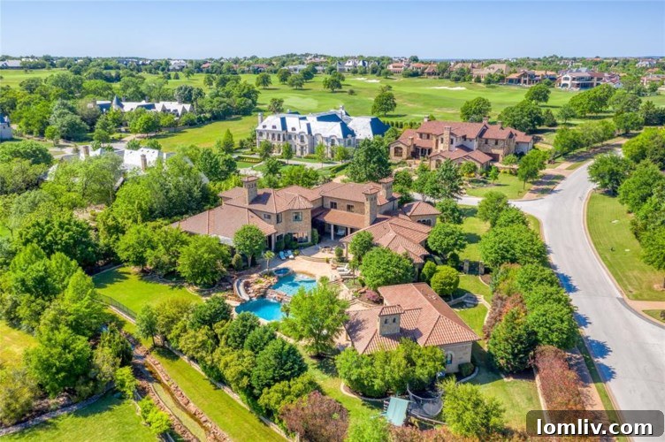 Panoramic view of Jason Witten's Mediterranean-style luxury home in Vaquero, Westlake, Texas, showcasing its impressive architecture and lush surroundings.