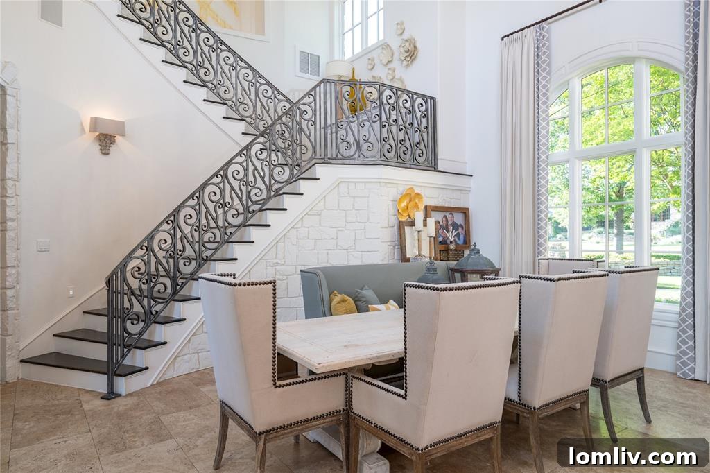 Cozy living space with comfortable seating, fireplace, and natural light in the Vaquero luxury home.