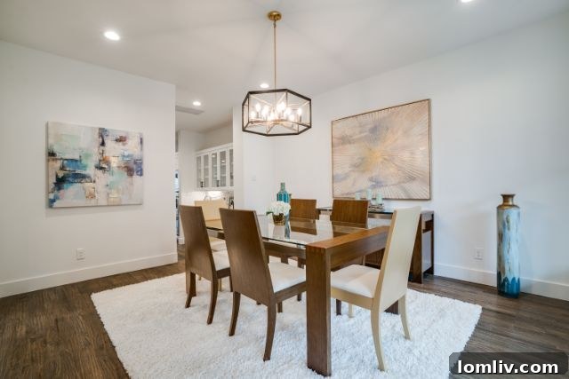 Immaculate New Build, Prime Location 6 Private backyard patio with sliding glass doors leading to the main living area, perfect for outdoor relaxation.