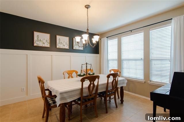 Formal dining room in Melissa, TX, showcasing striking black and white board-and-batten paneling