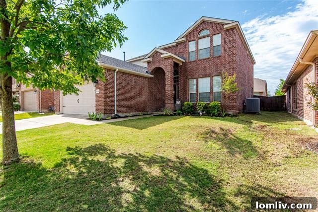 Cozy living room with a charming fireplace and contemporary decor in a Melissa, TX home
