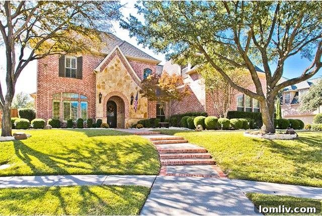 Elegant living room with ample natural light and high ceilings in a luxury McKinney home