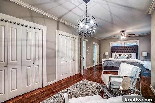 Spacious master bedroom with seating area at 5723 Monticello Ave, M Streets