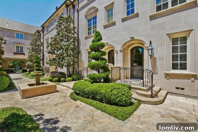 Contemporary luxury townhouse exterior with gated security in Highland Park