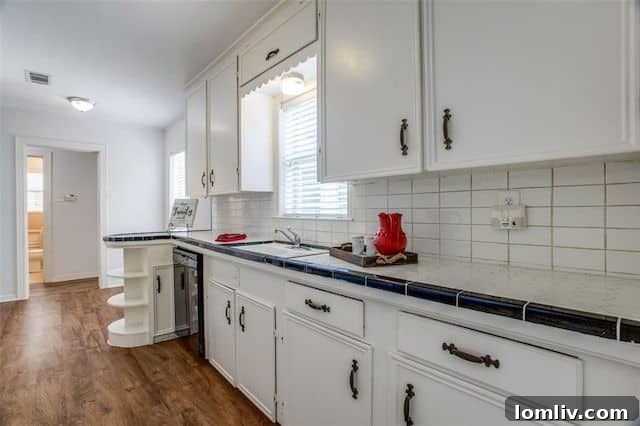 Dallas home renovation ideas, retro kitchen design, period pink tiles, original hardwood floors M Streets, vintage charm