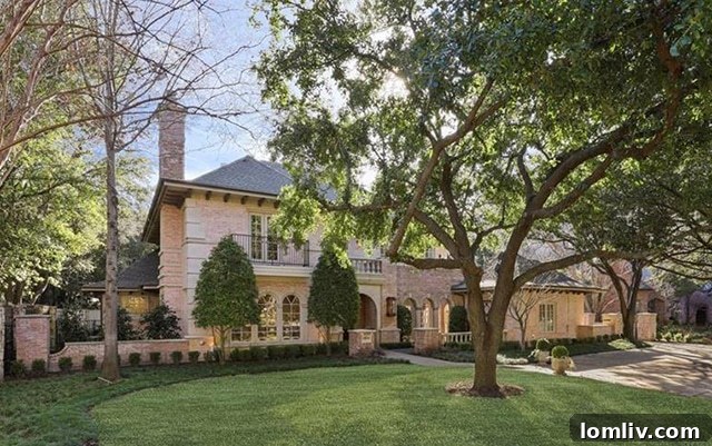 Luxury Home Exterior with Lush Landscaping in Preston Hollow