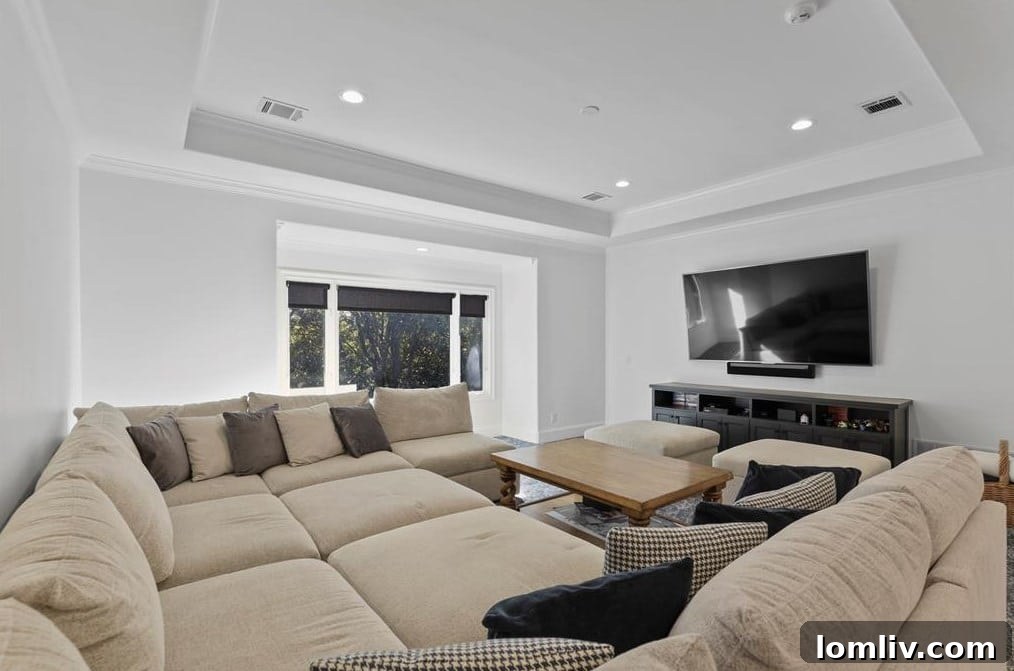 Modern Media Room with Comfortable Seating and Entertainment System
