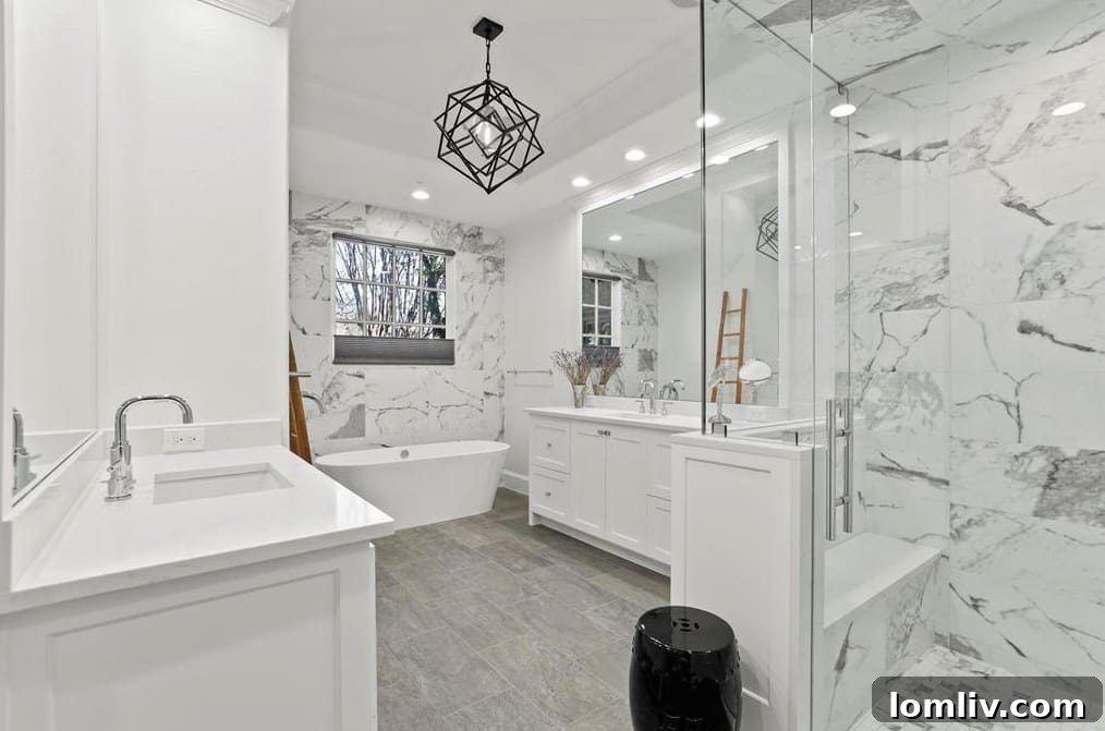 Luxurious Master Bathroom with Black and White Tile and Stone Flooring