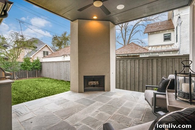 Outdoor living area with fireplace, grill, and Sonos sound system