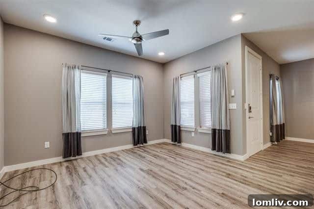 Spacious open-concept living and dining area with modern finishes