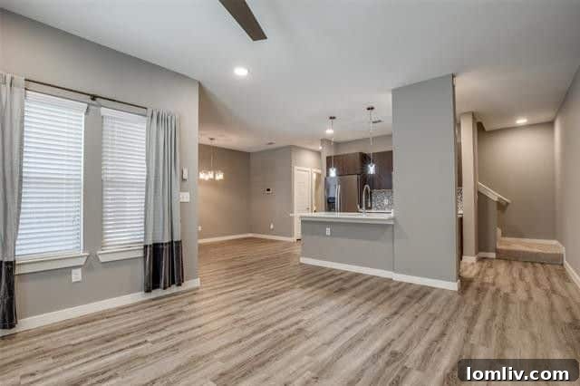 Gourmet kitchen with quartz countertops, stainless steel appliances, and large island