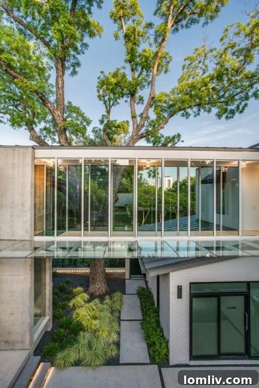 Elegant interior of 3601 Euclid Avenue, featuring modern design and a floating staircase.