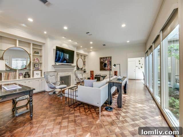 Modern kitchen with island and bar stools in 5715 Bordeaux Avenue.