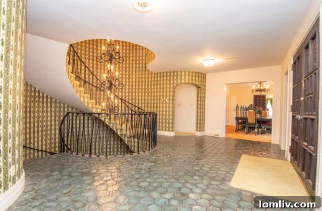 Grand Spiral Staircase with Fountain Feature
