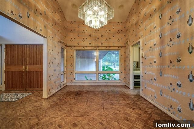 Three Homes From Another Dimension: Limitless Possibilities 4 Inviting interior living space with classic design elements.