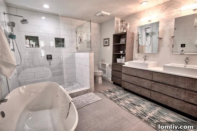 Spacious and bright bedroom with contemporary decor, ample natural light, and comfortable styling in a renovated Dallas property.