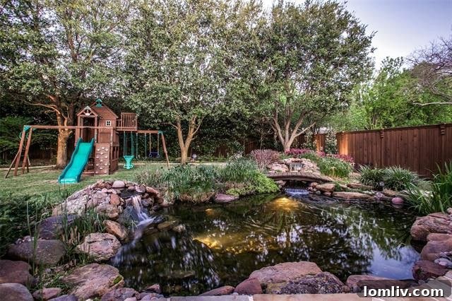 Masterfully Designed Oasis: Year-Round Splendor Awaits 4 Serene Koi Pond with Wooden Bridge - Dallas Home