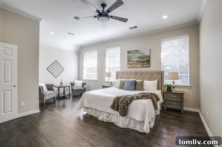 Masterfully Designed Oasis: Year-Round Splendor Awaits 9 Master Suite Sitting Area - Private Backyard View