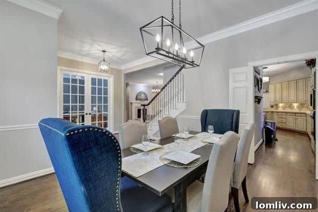 Modern kitchen with stainless steel appliances and granite countertops in Plano home