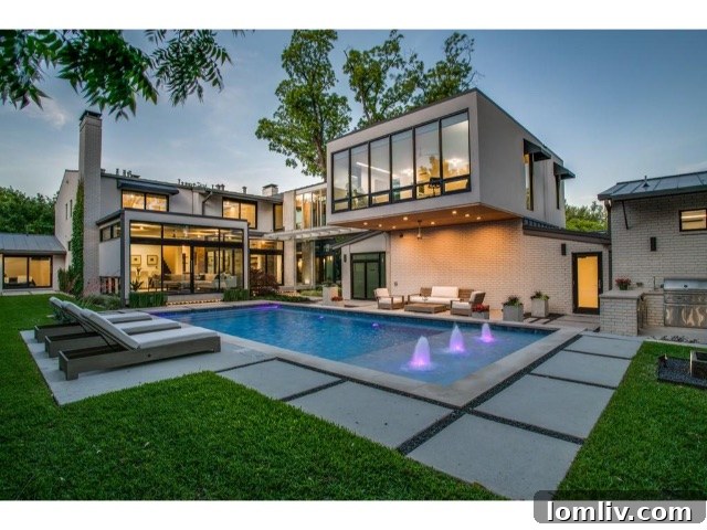Outdoor living space with sophisticated landscaping and lighting