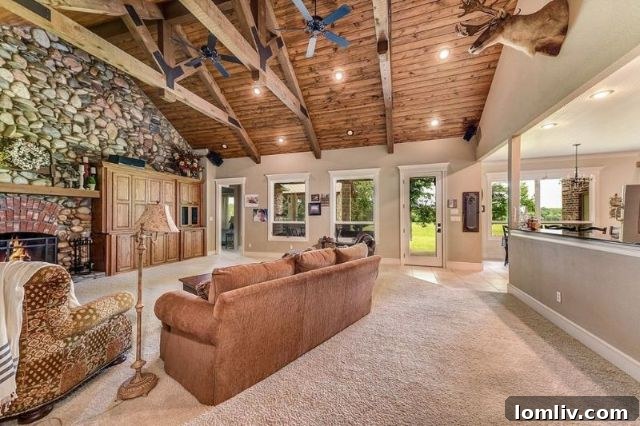 Living Room with Floor-to-Ceiling Stone Fireplace
