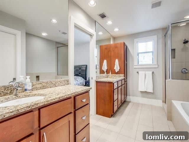 Luxurious Master Bathroom with Dual Vanities and Jetted Tub