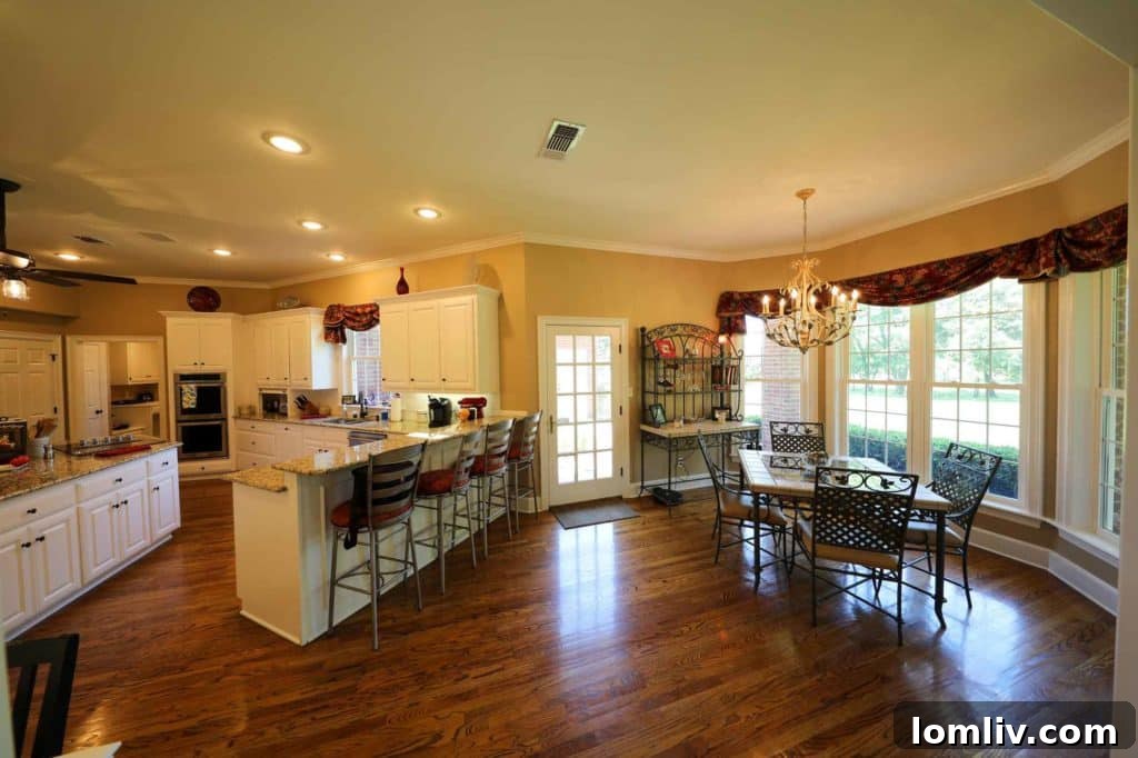 Modern kitchen with granite countertops and large island