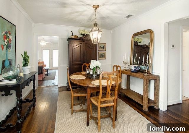 Inviting master bedroom with a large window, elegant decor, and ample space.