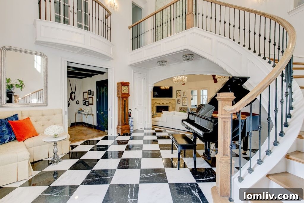 The stately exterior showcasing the French chateau elegance and inviting entrance