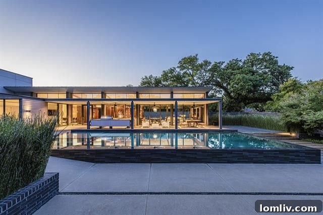 Signature Texas Modern: An AIA Dallas Tour Residence 23 Reflective water surface of the pool at sunset