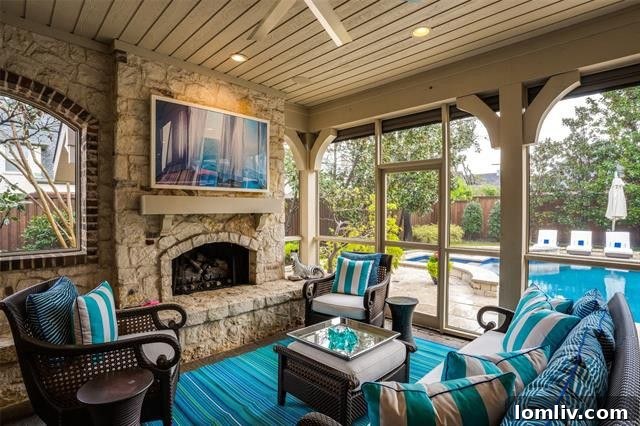 Preston Hollow Mansion: A Beauty Icon's Former Residence 15 Expansive outdoor living area with a covered patio