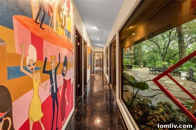 Kitchen with original cabinetry and retro artwork